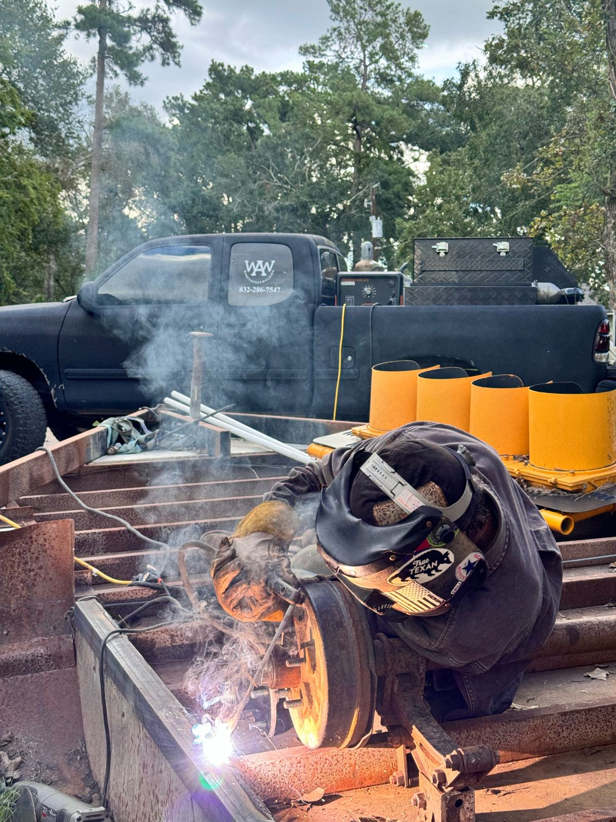 Windy Acres Welding truck on a trailer repair